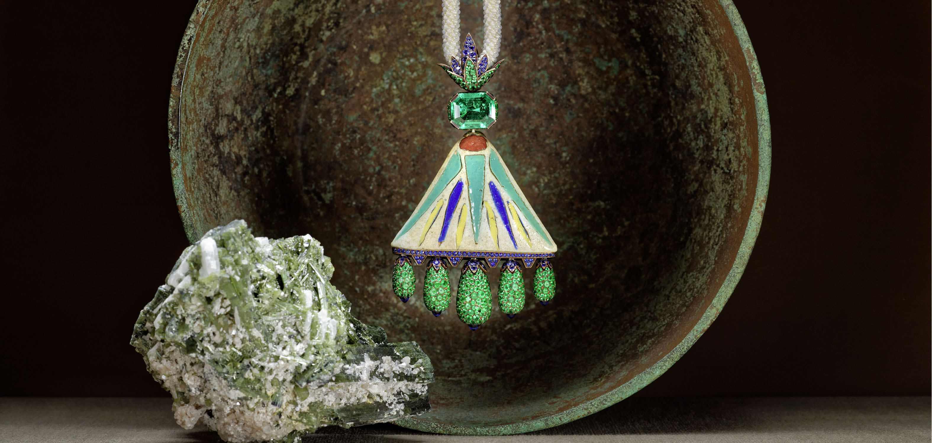 The necklace by Hemmerle is one of a kind with emeralds and Sapphires